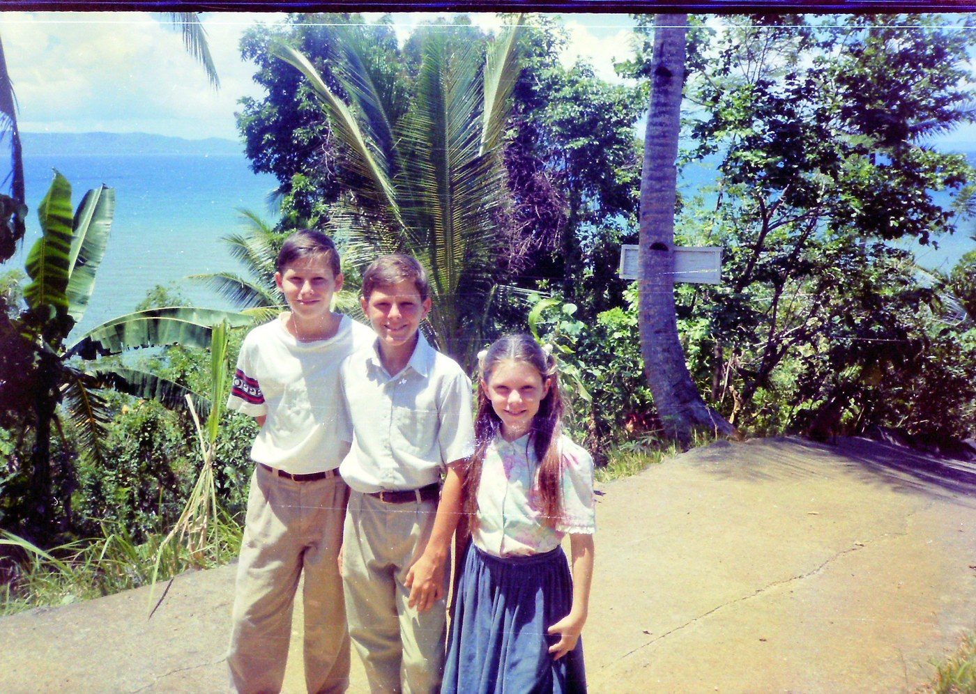 My brothers and me on our hill, with the ocean behind us, 1994–1996.