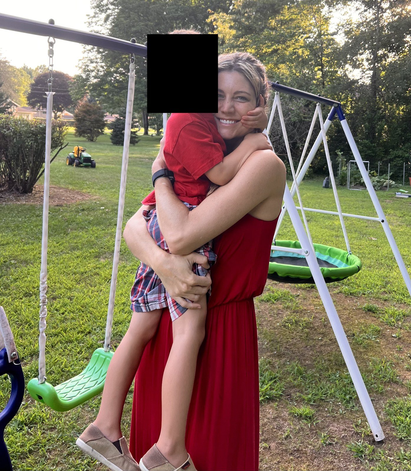 Me with one of my boys, August 2022.